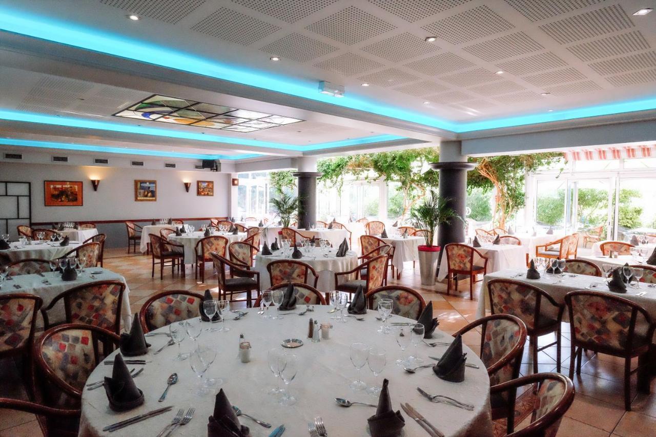 Logis Hotels - Hotel Restaurant L Enclos Donneville Екстер'єр фото