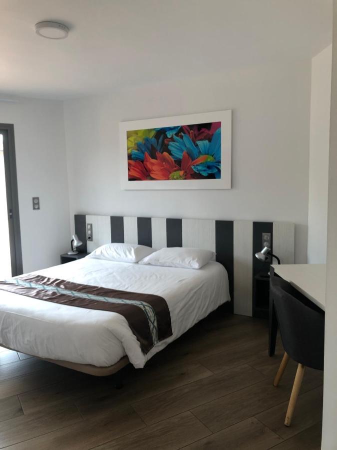 Logis Hotels - Hotel Restaurant L Enclos Donneville Екстер'єр фото